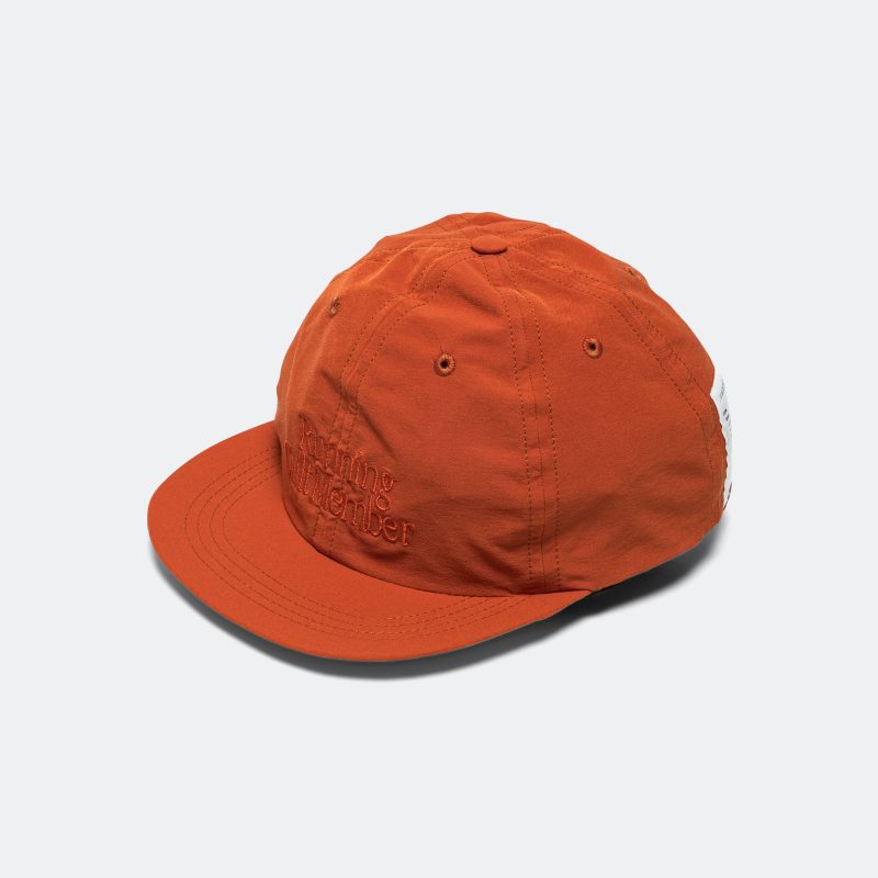 satisy running peace shell running cap rust 1